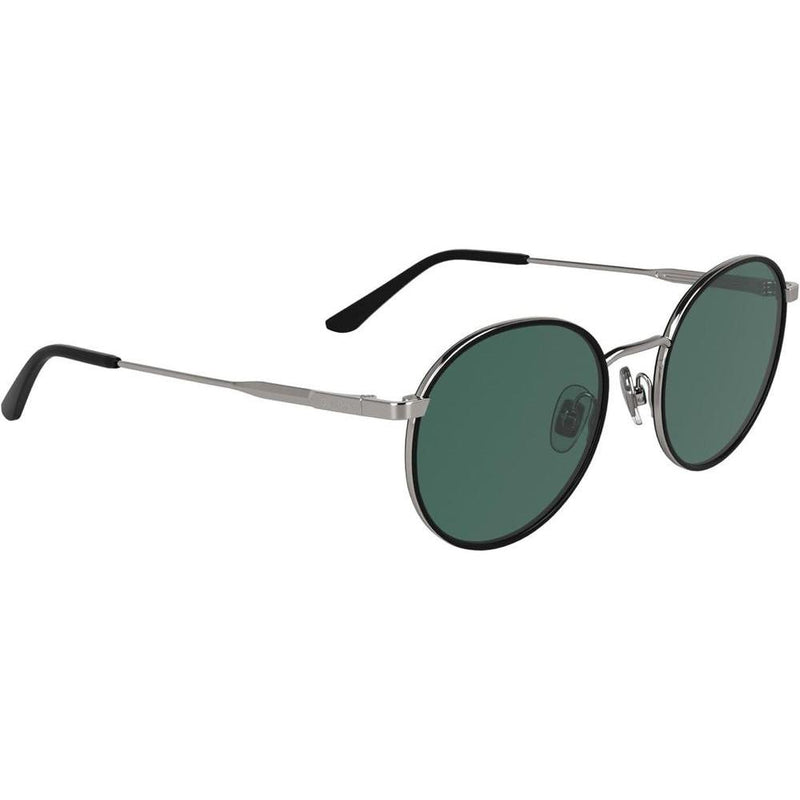 Gafas de sol redondas Calvin Klein CK25101S, diseño minimalista y elegante con detalles en metal, cómodas y ajustables