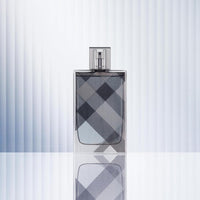 Burberry Brit Eau de Toilette Colonia Woody para hombre con notas de cedro, mandarina, rosa silvestre y haba tonka