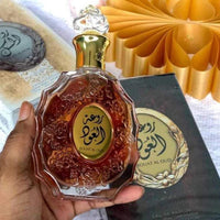 Lattafa Rouat Al Oud Eau de Parfum en espray unisex, fragancia amaderada y especiada para uso diario