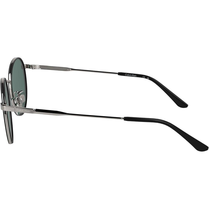 Gafas de sol redondas Calvin Klein CK25101S, diseño minimalista y elegante con detalles en metal, cómodas y ajustables