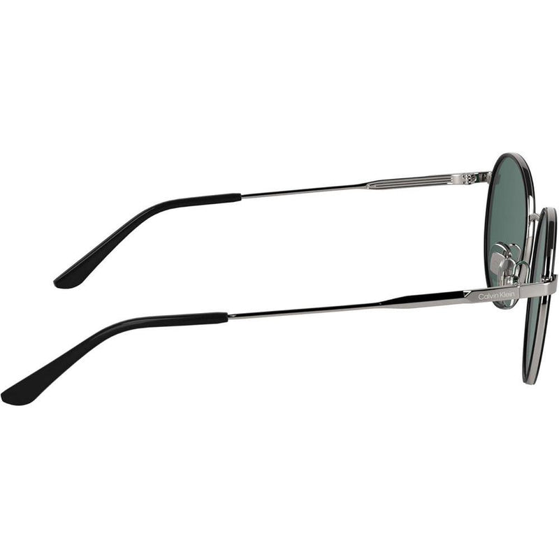 Gafas de sol redondas Calvin Klein CK25101S, diseño minimalista y elegante con detalles en metal, cómodas y ajustables
